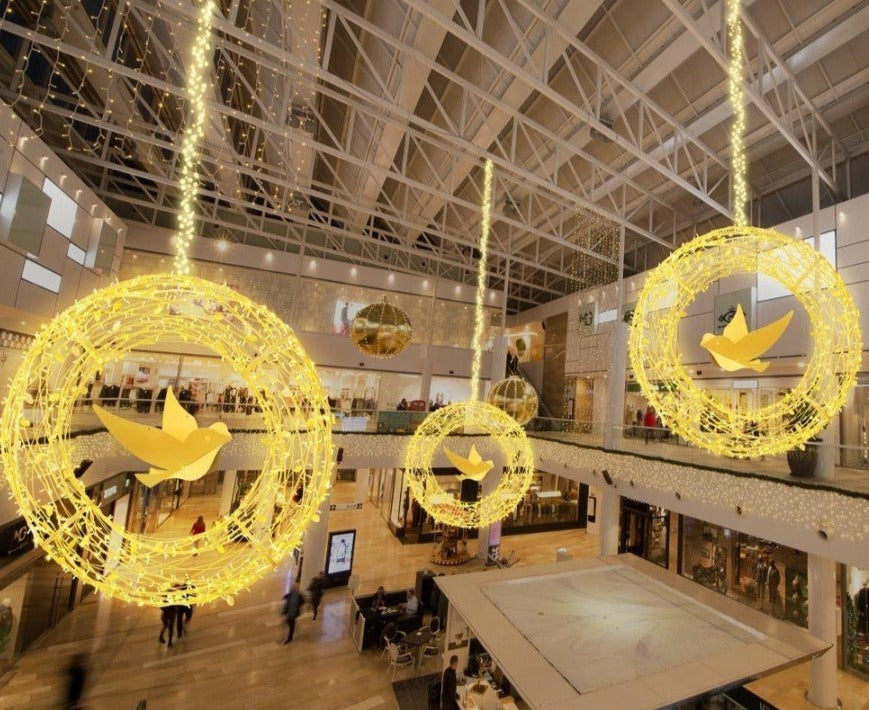 Modern Mall Holiday Display with Leavesden Vine Wreaths and Bird Center