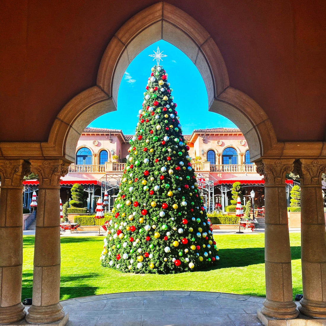 Premium commercial panel tower tree, lit and decorated, sized for a public plaza