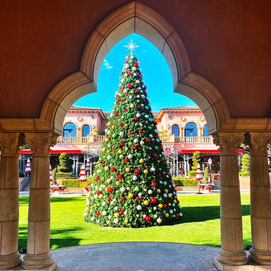 Premium commercial panel tower tree, lit and decorated, sized for a public plaza
