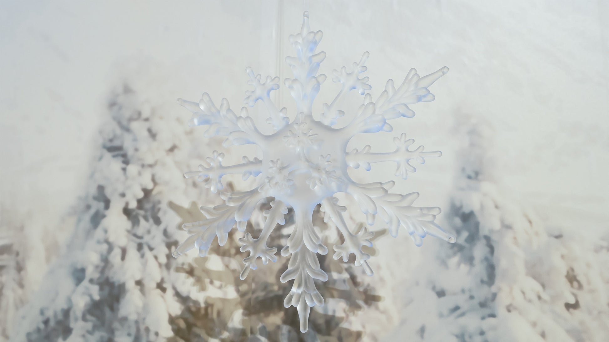 Sold in increments of 4; 9-inch frosted acrylic snowflake ornaments for commercial holiday displays
