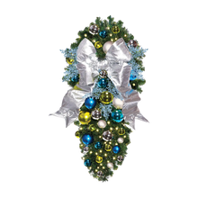 Decorated 4' Coastal Spray with 18" red bow, pre-decorated pine foliage with turquoise, apple green and silver ornaments