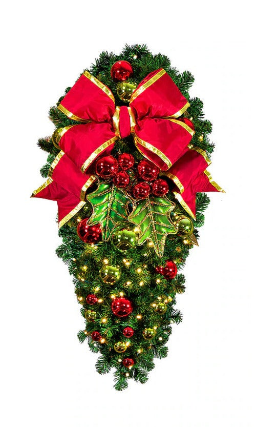 Holly Leaf Spray with Bow, 4' mountain pine, pre-lit 100 warm white LEDs, metal holly leaves, red bow with gold trim