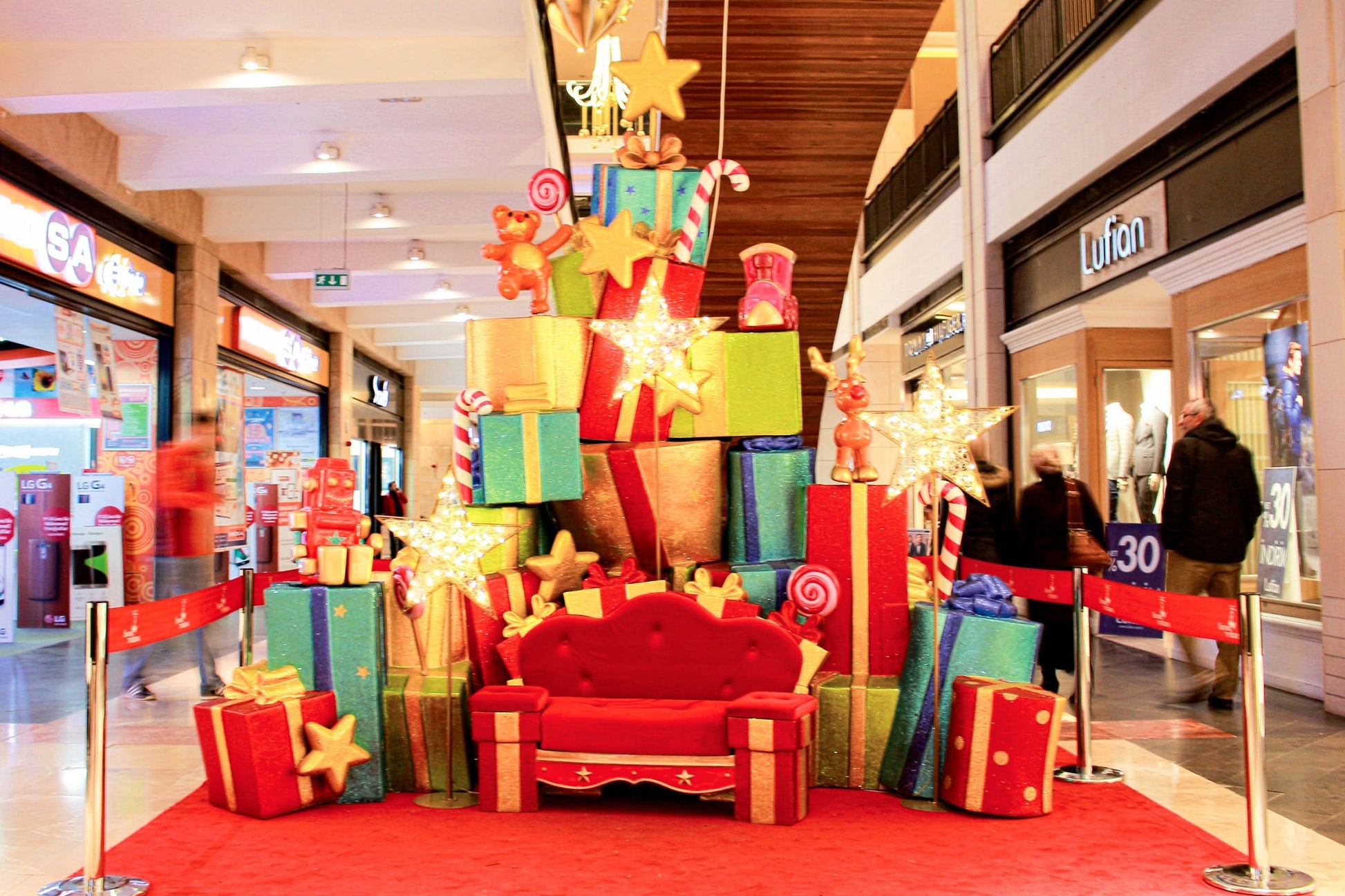 Constructed with glittering red and gold fiberglass details and vibrant red material