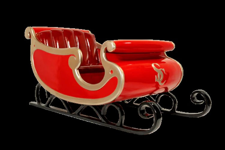 Santa's Sleigh display prop, fiberglass sleigh painted red with gold and green accents, 81" L x 39" W x 39" H, seats two adults, 400 lb, indoor/outdoor