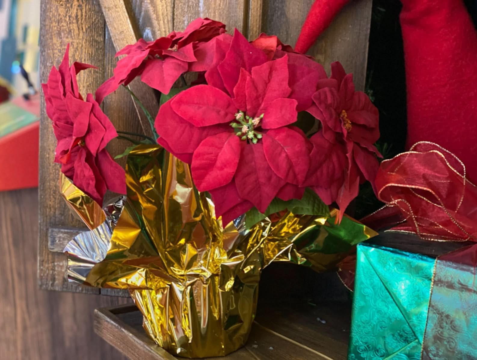 Silk plant construction, about 14-15" tall with ~8 flowers; fits Poinsettia Tree frame and suits rooms or offices