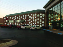LED Snowflakes Mounted as Building Front Displays