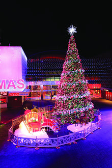Large LED Snowfall Tree Topper on Giant Commercial Tree Display